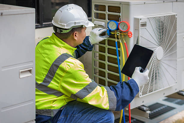 Professional Air Conditioning Repair technician working in Glenville, CT